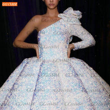 Load image into Gallery viewer, Dubai White Wedding Dresses Lace Up Ball Gown Fluffy Sequined Sparkly One Shoulder Bridal Gowns Long Sleeves Robe De Mariee 2020